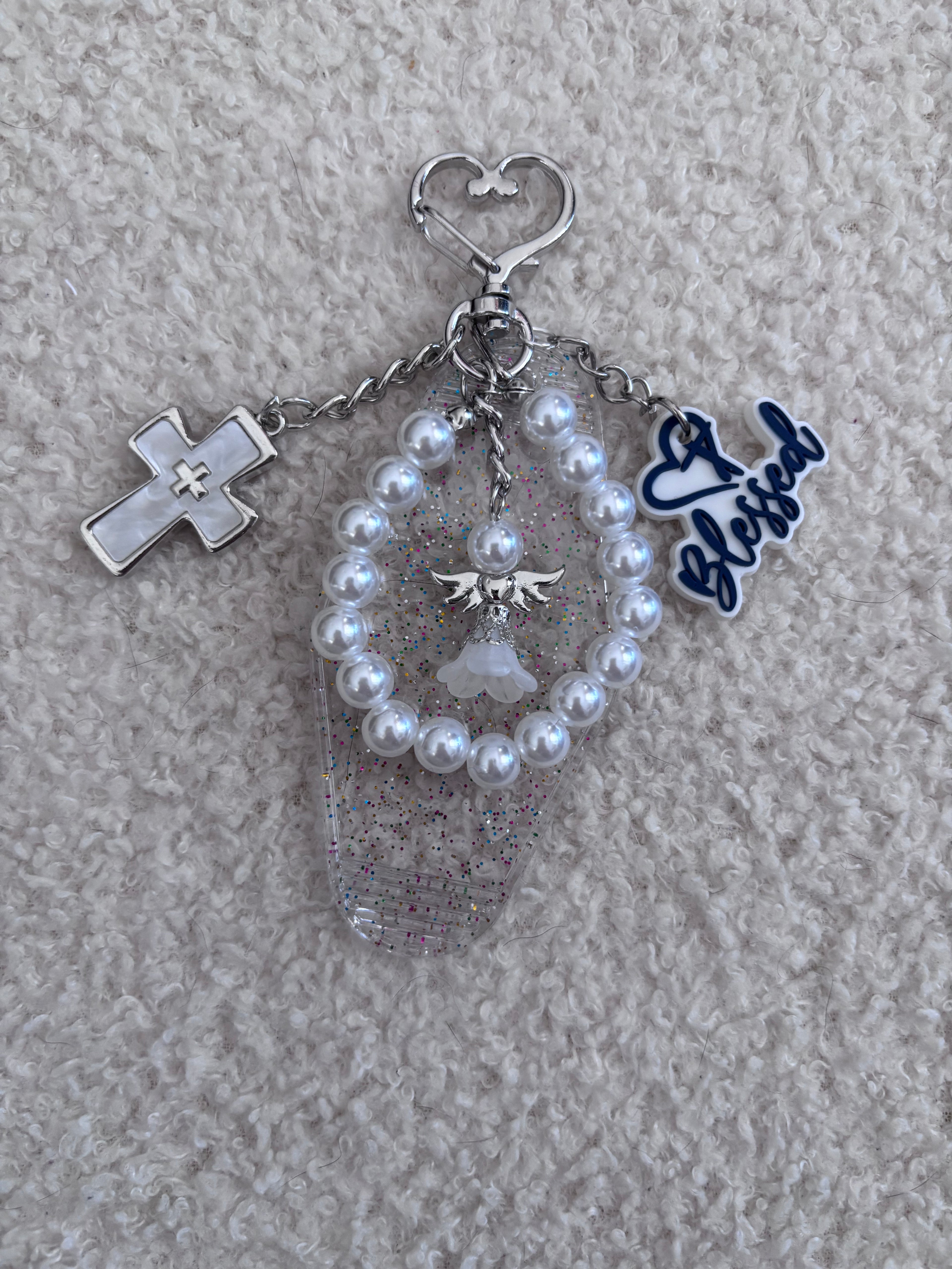 Porte clé / Grigri de Sac Croix Religieuse Blanche